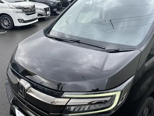 ホンダ ステップワゴン スパーダ クルスピセンシング 山形県 2020(令2)年 2.3万km プレミアムスパークルブラックパール 純正9型メモリーナビゲーション【VXM-227VFNi】/フルセグ　CD DVD　AM FM SD　MUSICRACK　USB　iPod　Bluetooth　/純正後席フリップダウンモニター【VM-185EN】/マルチビューカメラシステム/ブラックスタイル/わくわくゲート/両側電動スライドドア【サンシェード】/ホンダセンシング/CMBS衝突軽減ブレーキ/アダブティブクルーズコントロール/LKAS車線維持支援システム/路外逸脱抑制機能/誤発進抑制機能/先行車発進お知らせ機能/標識認識機能/歩行者事故低減ステアリング/ビルトインETC2.0/純正前後ドライブレコーダー/アイドリングストップ/革巻きステアリング/パドルシフト/プラズマクラスター付きトリプルゾーンオートエアコン/スポーツペダル/超高機能付LED式マップランプ/合皮コンビシート/前席シートバックテーブル/前席シートヒーター/プッシュスタート/スマートキー/LEDヘッドランプ/LEDフロントフォグランプ/オートライト/純正サイド/リアスポイラー/純正17インチアルミホイール/スペアキー