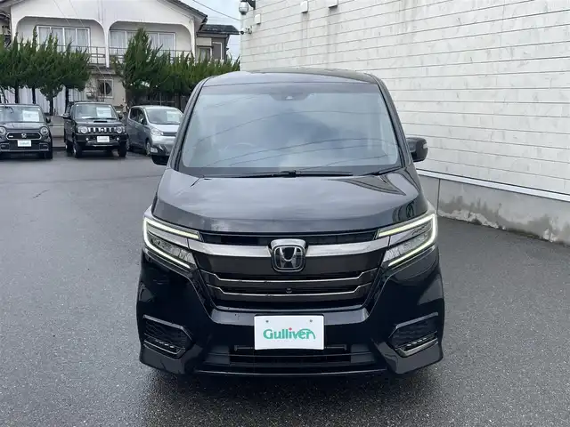 ホンダ ステップワゴン スパーダ クルスピセンシング 山形県 2020(令2)年 2.3万km プレミアムスパークルブラックパール 純正9型メモリーナビゲーション【VXM-227VFNi】/フルセグ　CD DVD　AM FM SD　MUSICRACK　USB　iPod　Bluetooth　/純正後席フリップダウンモニター【VM-185EN】/マルチビューカメラシステム/ブラックスタイル/わくわくゲート/両側電動スライドドア【サンシェード】/ホンダセンシング/CMBS衝突軽減ブレーキ/アダブティブクルーズコントロール/LKAS車線維持支援システム/路外逸脱抑制機能/誤発進抑制機能/先行車発進お知らせ機能/標識認識機能/歩行者事故低減ステアリング/ビルトインETC2.0/純正前後ドライブレコーダー/アイドリングストップ/革巻きステアリング/パドルシフト/プラズマクラスター付きトリプルゾーンオートエアコン/スポーツペダル/超高機能付LED式マップランプ/合皮コンビシート/前席シートバックテーブル/前席シートヒーター/プッシュスタート/スマートキー/LEDヘッドランプ/LEDフロントフォグランプ/オートライト/純正サイド/リアスポイラー/純正17インチアルミホイール/スペアキー