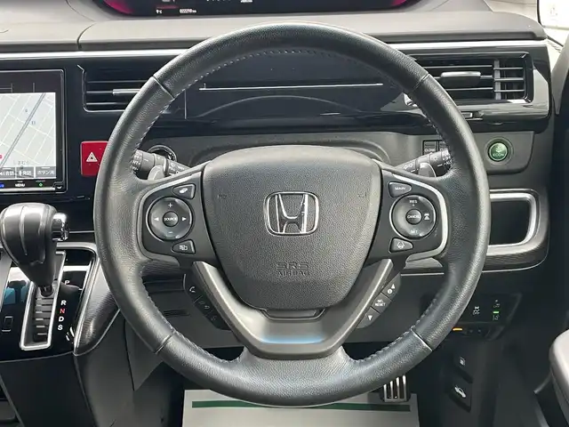 ホンダ ステップワゴン スパーダ クルスピセンシング 山形県 2020(令2)年 2.3万km プレミアムスパークルブラックパール 純正9型メモリーナビゲーション【VXM-227VFNi】/フルセグ　CD DVD　AM FM SD　MUSICRACK　USB　iPod　Bluetooth　/純正後席フリップダウンモニター【VM-185EN】/マルチビューカメラシステム/ブラックスタイル/わくわくゲート/両側電動スライドドア【サンシェード】/ホンダセンシング/CMBS衝突軽減ブレーキ/アダブティブクルーズコントロール/LKAS車線維持支援システム/路外逸脱抑制機能/誤発進抑制機能/先行車発進お知らせ機能/標識認識機能/歩行者事故低減ステアリング/ビルトインETC2.0/純正前後ドライブレコーダー/アイドリングストップ/革巻きステアリング/パドルシフト/プラズマクラスター付きトリプルゾーンオートエアコン/スポーツペダル/超高機能付LED式マップランプ/合皮コンビシート/前席シートバックテーブル/前席シートヒーター/プッシュスタート/スマートキー/LEDヘッドランプ/LEDフロントフォグランプ/オートライト/純正サイド/リアスポイラー/純正17インチアルミホイール/スペアキー