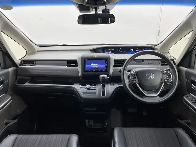 ホンダ フリード G ホンダセンシング 茨城県 2017(平29)年 1.8万km プレミアムスパークルブラックパール 純正ナビ/Bluetooth/ワンセグ/CD/DVD/AM/FM/フリップダウンモニター/前後ドラレコ/両側パワースライドドア/コンフォートビューパッケージ/ビルトインETC/バックカメラ/レーダークルーズコントロール/レーンキープアシスト/LEDヘッドライト/オートライト