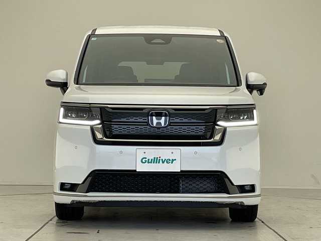 ホンダ ステップワゴン スパーダ eHEV 愛知県 2025(令7)年 0.1千km プラチナホワイトパール 登録済未使用車/純正11.4型ナビ/両側パワースライドドア/レーダークルーズコントロール/シートヒーター/バックカメラ/電動リアゲート/コーナーセンサー/純正アルミホイール/ブラインドスポットモニター/LEDヘッドライト/パドルシフト/リアオートエアコン/衝突軽減システム/フルセグ/CD DVD/Bluetooth/ステアリングスイッチ/スマートキー/プッシュスタート