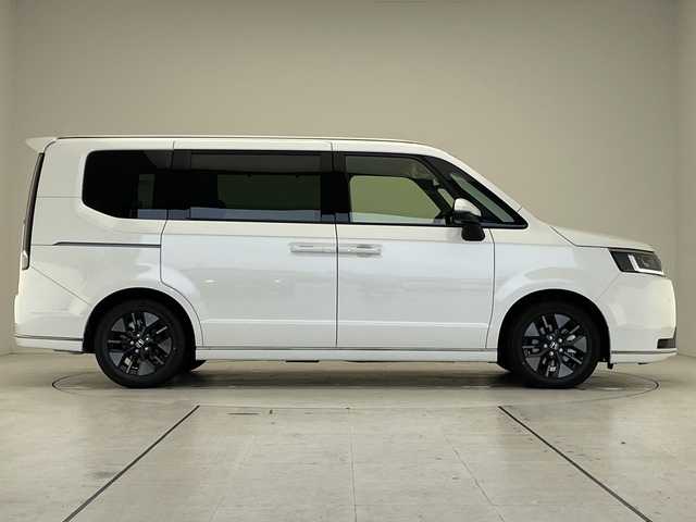 ホンダ ステップワゴン スパーダ eHEV 愛知県 2025(令7)年 0.1千km プラチナホワイトパール 登録済未使用車/純正11.4型ナビ/両側パワースライドドア/レーダークルーズコントロール/シートヒーター/バックカメラ/電動リアゲート/コーナーセンサー/純正アルミホイール/ブラインドスポットモニター/LEDヘッドライト/パドルシフト/リアオートエアコン/衝突軽減システム/フルセグ/CD DVD/Bluetooth/ステアリングスイッチ/スマートキー/プッシュスタート