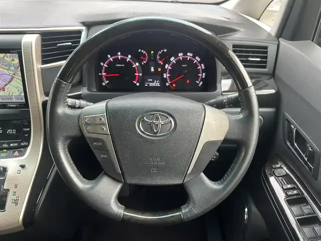 トヨタ ヴェルファイア 2．4Z ゴールデンアイズ 滋賀県 2013(平25)年 10.4万km ブラック (株)IDOMが運営する【じしゃロン草津店】の自社ローン専用車両になりますこちらは現金またはオートローンご利用時の価格です。自社ローンご希望の方は別途その旨お申付け下さい/エクリプスナビ(AVN-ZX02i)/フルセグTV/Bluetooth/CD/DVD/フリップダウンモニター/バックカメラ/クルーズコントロール/前後コーナーセンサー/両側パワースライドドア/電動リアゲート/ビルトインETC/ステアリングスイッチ/横滑り防止装置/カーテンエアバック/純正アルミホイール/保証書/取扱説明書