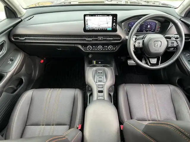 ホンダ ＺＲ－Ｖ ハイブリッド e:HEV Z 愛媛県 2022(令4)年 1.8万km ワイン 禁煙車/登録時走行距離:17952km/純正9型ナビ/フルセグTV/ハンズフリーパワーバックドア/全周囲カメラ/ビルトインETC2.0/アダプティブクルーズコントロール/コーナーセンサー/ホンダセンシング/・衝突軽減ブレーキ/・前後誤発進抑制機能/・車線維持支援システム/・先行車発進お知らせ機能/・標識認識機能/・オートハイビーム/・ブラインドスポットモニター/・後退出庫サポート/LEDヘッドランプ/革巻きステアリング/ステアリングヒーター/パドルシフト/本革シート/前席パワーシート/シートヒーター/運転席ポジションメモリー/純正18インチアルミホイール/スマートキーシステム