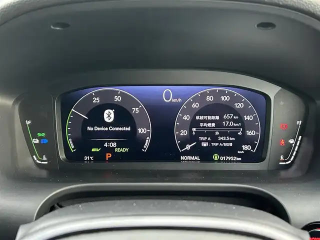 ホンダ ＺＲ－Ｖ ハイブリッド e:HEV Z 愛媛県 2022(令4)年 1.8万km ワイン 禁煙車/登録時走行距離:17952km/純正9型ナビ/フルセグTV/ハンズフリーパワーバックドア/全周囲カメラ/ビルトインETC2.0/アダプティブクルーズコントロール/コーナーセンサー/ホンダセンシング/・衝突軽減ブレーキ/・前後誤発進抑制機能/・車線維持支援システム/・先行車発進お知らせ機能/・標識認識機能/・オートハイビーム/・ブラインドスポットモニター/・後退出庫サポート/LEDヘッドランプ/革巻きステアリング/ステアリングヒーター/パドルシフト/本革シート/前席パワーシート/シートヒーター/運転席ポジションメモリー/純正18インチアルミホイール/スマートキーシステム