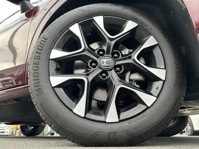 ホンダ ＺＲ－Ｖ ハイブリッド e:HEV Z 愛媛県 2022(令4)年 1.8万km ワイン 禁煙車/登録時走行距離:17952km/純正9型ナビ/フルセグTV/ハンズフリーパワーバックドア/全周囲カメラ/ビルトインETC2.0/アダプティブクルーズコントロール/コーナーセンサー/ホンダセンシング/・衝突軽減ブレーキ/・前後誤発進抑制機能/・車線維持支援システム/・先行車発進お知らせ機能/・標識認識機能/・オートハイビーム/・ブラインドスポットモニター/・後退出庫サポート/LEDヘッドランプ/革巻きステアリング/ステアリングヒーター/パドルシフト/本革シート/前席パワーシート/シートヒーター/運転席ポジションメモリー/純正18インチアルミホイール/スマートキーシステム