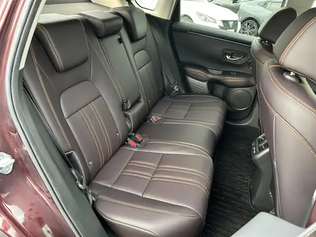 ホンダ ＺＲ－Ｖ ハイブリッド e:HEV Z 愛媛県 2022(令4)年 1.8万km ワイン 禁煙車/登録時走行距離:17952km/純正9型ナビ/フルセグTV/ハンズフリーパワーバックドア/全周囲カメラ/ビルトインETC2.0/アダプティブクルーズコントロール/コーナーセンサー/ホンダセンシング/・衝突軽減ブレーキ/・前後誤発進抑制機能/・車線維持支援システム/・先行車発進お知らせ機能/・標識認識機能/・オートハイビーム/・ブラインドスポットモニター/・後退出庫サポート/LEDヘッドランプ/革巻きステアリング/ステアリングヒーター/パドルシフト/本革シート/前席パワーシート/シートヒーター/運転席ポジションメモリー/純正18インチアルミホイール/スマートキーシステム