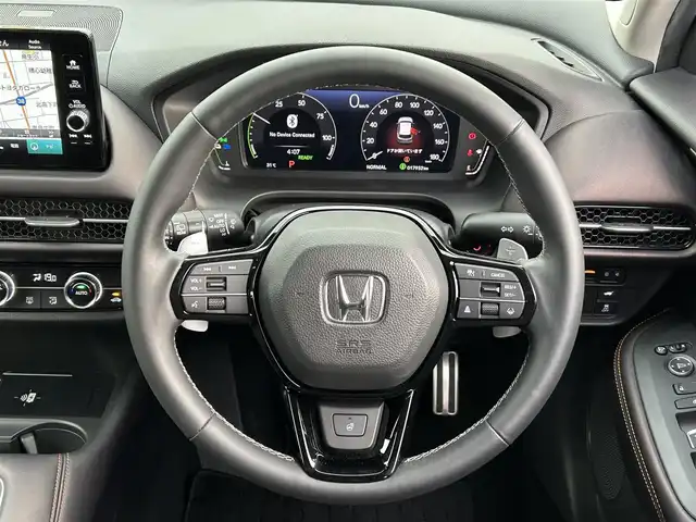 ホンダ ＺＲ－Ｖ ハイブリッド e:HEV Z 愛媛県 2022(令4)年 1.8万km ワイン 禁煙車/登録時走行距離:17952km/純正9型ナビ/フルセグTV/ハンズフリーパワーバックドア/全周囲カメラ/ビルトインETC2.0/アダプティブクルーズコントロール/コーナーセンサー/ホンダセンシング/・衝突軽減ブレーキ/・前後誤発進抑制機能/・車線維持支援システム/・先行車発進お知らせ機能/・標識認識機能/・オートハイビーム/・ブラインドスポットモニター/・後退出庫サポート/LEDヘッドランプ/革巻きステアリング/ステアリングヒーター/パドルシフト/本革シート/前席パワーシート/シートヒーター/運転席ポジションメモリー/純正18インチアルミホイール/スマートキーシステム