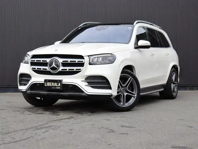 メルセデス・ベンツ ＧＬＳ４００ｄ 4マチック AMGライン 静岡県 2021(令3)年 4.3万km ダイヤモンドホワイト ●パノラミックスライディングルーフ/●MBUX(メルセデスユーザーエクスペリエンス)/12.3インチワイドディスプレイ/12.3インチコクピットディスプレイ/●Burmesterサラウンドサウンドシステム/●ワイヤレスチャージング/●本革シート/●ステアリングヒーター/●メモリー付パワーシート(前席)/●６ウェイパワーシート(２列目左右)/●電動ランバーサポート(前席)/●シートヒーター(全列左右)/●シートベンチレーター(前席)/●レザーARTICOダッシュボード/●温冷機能付カップホルダー(前席)/●アンビエントライト(64色)/●ヘッドアップディスプレイ/●エナジャイジングパッケージ/●エアバランスパッケージ(パフュームアドマイザー付)/●キーレスゴー/●フットトランクオープナー(テールゲート自動開閉機能)/●純正２１インチアルミホイール/●レーダーセーフティパッケージ/●３６０度カメラシステム/●パークトロニック/●アクティブパーキングアシスト(縦列・並列駐車)/●リアクロストラフィックアラート/●マルチビームLEDヘッドライト(ウルトラハイビーム付)/●アダプティブハイビームアシストプラス/●LEDコーナリングライト