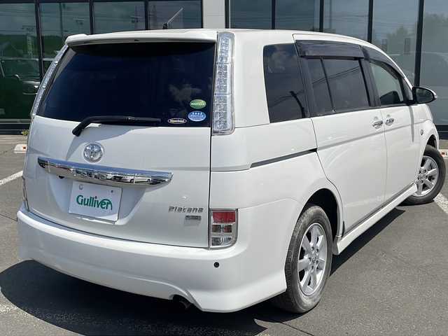 トヨタ アイシス プラタナ Vセレクション 道東・釧路十勝 2016(平28)年 6.6万km ホワイトパールクリスタルシャイン ・4WD/・純正SDナビ/(CD・DVD・フルセグ・BT・FM・AM)/・バックカメラ/・スマートキー/・プッシュスタート/・ETC/・片側パワースライドドア/・リアヒーター/・リアクーラー/・コーナーセンサー/・横滑り防止/・HIDヘッドライト/・フォグライト/・オートライト/・ステアリングスイッチ/・社外AW付冬タイヤ　積込