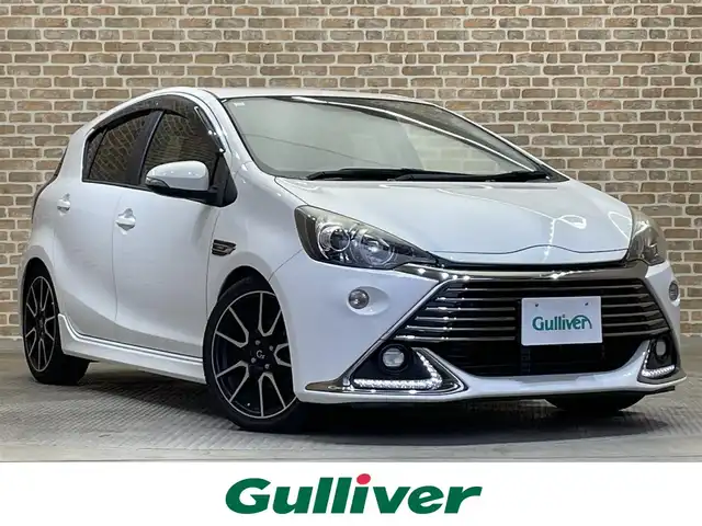 トヨタ アクア G G’s 岩手県 2015(平27)年 10.6万km ライムホワイトパールクリスタルシャイン 寒冷地仕様/専用エクステリア・インテリア/専用セッティングダンパー・ローダウンスプリング/専用アルカンターラ・合成皮革コンビスポーツシート/クルーズコントロール/横滑り防止装置/シートヒーター/オートエアコン/純正ナビ/フルセグTV/ステアリングスイッチ/バックカメラ/ETC/オートライト/LEDヘッドライト/LEDフォグライト/純正１７インチアルミホイール/純正フロアマット