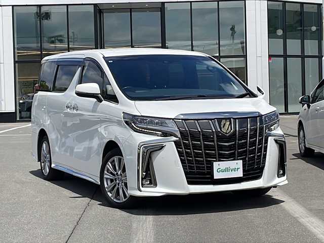 トヨタ アルファード S タイプゴールドⅡ 青森県 2021(令3)年 8.8万km ホワイトパールクリスタルシャイン ・寒冷地仕様/・4WD/・純正ディスプレイオーディオ/・フルセグ/・バックカメラ/・DVD/USB/HDMI/Bluetooth/・フリップダウンモニター/・プッシュスタート/・スマートキー/・スペアキー1本/・純正エンジンスターター/・Toyota Safety Sense/・オートライト/・オートマチックハイビーム/・MTモード付AT/・アイドリングストップ/・ビルドインETC/・ワイパーデアイサ/・両側パワースライドドア/・オットマン/・純正AW/・社外フロアマット/・純正ドアバイザー