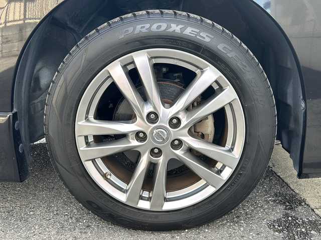 日産 エルグランド 250ハイウェイスター 埼玉県 2012(平24)年 10.4万km ファントムブラック (株)IDOMが運営する【じしゃロン熊谷店】の自社ローン専用車両になりますこちらは現金またはオートローンご利用時の価格です。自社ローンご希望の方は別途その旨お申付け下さい/純正SDナビ/（フルセグTV/Bluetooth/AM/FM/CD/DVD/AUX)/バックカメラ/ETC/両側パワースライドドア/ロールサンシェード/オットマン/プッシュスタート/スマートキースペアキー×1/純正ドアバイザー/LEDオートヘッドライト/車両・ナビ取扱説明書/保証書