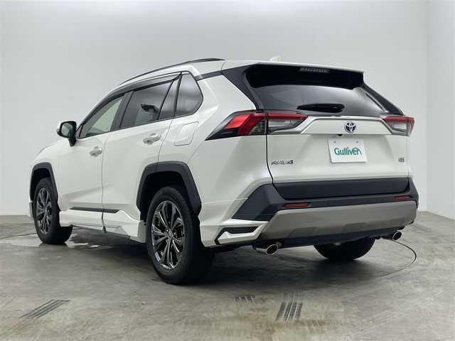 トヨタ ＲＡＶ４ ハイブリッドG 福岡県 2022(令4)年 2.9万km ホワイトパールクリスタルシャイン 純正９インチディスプレイオーディオ/（BT/USB/Carplay/IPod)/衝突軽減ブレーキ/全周囲カメラ/追従型クルーズコントロール/レーンキープアシスト/踏み間違い防止/コーナーセンサー/ブラインドスポットモニター/モデリスタ（前・横・後下）/ルーフレール/シートヒーター(運転席・助手席）/エアシート（運転席・助手席）/電動リアゲート/ステアリングヒーター/ドライブレコーダー（前・後）/パワーシート/電動リアゲート/ＬＥＤヘッドライト/オートハイビーム/オートライト/フォグランプ/プッシュスタート/ビルトインＥＴＣ/スマートキー×1/アイドリングストップ/純正フロアマット/純正18インチAW/ISOFIX/ステアリングスイッチ/チルトステアリング/シートリフター/ウインカーミラー/ドアバイザー/新車保証書/取扱説明書/スペアキー×１