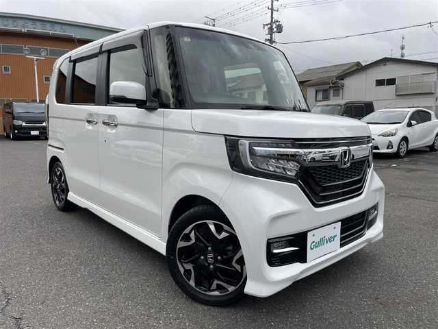 ホンダ Ｎ ＢＯＸ カスタム G L ターボ ホンダセンシング 静岡県 2020(令2)年 3.3万km プラチナホワイトパール 両側パワースライドドア/純正8インチメモリナビ・フルセグTV/DVD/CD/SD/USB/Bluetooth/バックカメラ/純正エアロ/純正15インチアルミホイール/HONDA SENSING/・アダプティブクルーズコントロール（ACC）/・衝突軽減ブレーキ（CMBS）/・車線維持支援システム（LKAS）/・誤発進抑制機能/・先行車発進お知らせ機能/・オートハイビーム/・標識認識機能/ハーフレザーシート/パドルシフト/ビルトインETC/LEDライト/スマートキー2個/プッシュスタート/新車時保証書/取扱説明書/ナビ取扱説明書