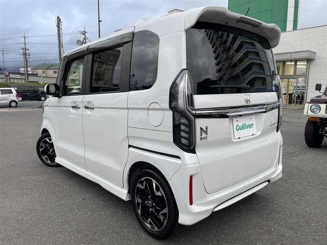 ホンダ Ｎ ＢＯＸ カスタム G L ターボ ホンダセンシング 静岡県 2020(令2)年 3.3万km プラチナホワイトパール 両側パワースライドドア/純正8インチメモリナビ・フルセグTV/DVD/CD/SD/USB/Bluetooth/バックカメラ/純正エアロ/純正15インチアルミホイール/HONDA SENSING/・アダプティブクルーズコントロール（ACC）/・衝突軽減ブレーキ（CMBS）/・車線維持支援システム（LKAS）/・誤発進抑制機能/・先行車発進お知らせ機能/・オートハイビーム/・標識認識機能/ハーフレザーシート/パドルシフト/ビルトインETC/LEDライト/スマートキー2個/プッシュスタート/新車時保証書/取扱説明書/ナビ取扱説明書