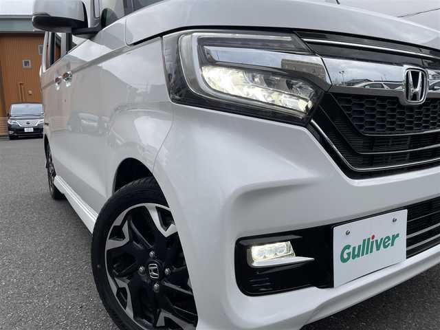 ホンダ Ｎ ＢＯＸ カスタム G L ターボ ホンダセンシング 静岡県 2020(令2)年 3.3万km プラチナホワイトパール 両側パワースライドドア/純正8インチメモリナビ・フルセグTV/DVD/CD/SD/USB/Bluetooth/バックカメラ/純正エアロ/純正15インチアルミホイール/HONDA SENSING/・アダプティブクルーズコントロール（ACC）/・衝突軽減ブレーキ（CMBS）/・車線維持支援システム（LKAS）/・誤発進抑制機能/・先行車発進お知らせ機能/・オートハイビーム/・標識認識機能/ハーフレザーシート/パドルシフト/ビルトインETC/LEDライト/スマートキー2個/プッシュスタート/新車時保証書/取扱説明書/ナビ取扱説明書