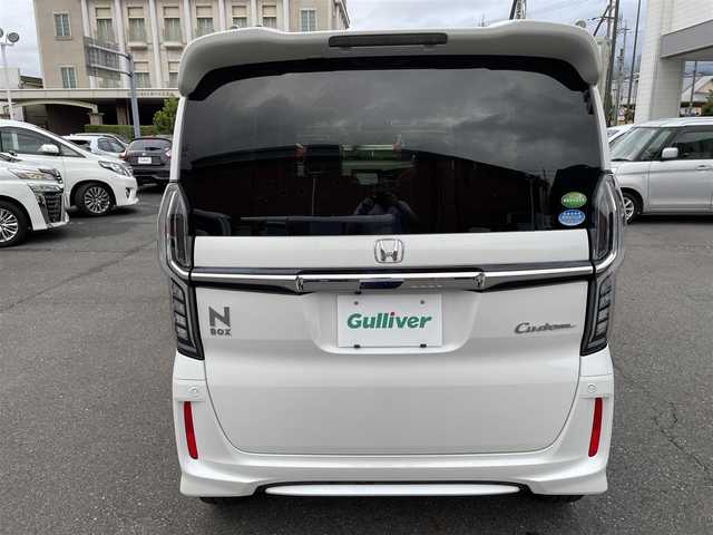 ホンダ Ｎ ＢＯＸ カスタム G L ターボ ホンダセンシング 静岡県 2020(令2)年 3.3万km プラチナホワイトパール 両側パワースライドドア/純正8インチメモリナビ・フルセグTV/DVD/CD/SD/USB/Bluetooth/バックカメラ/純正エアロ/純正15インチアルミホイール/HONDA SENSING/・アダプティブクルーズコントロール（ACC）/・衝突軽減ブレーキ（CMBS）/・車線維持支援システム（LKAS）/・誤発進抑制機能/・先行車発進お知らせ機能/・オートハイビーム/・標識認識機能/ハーフレザーシート/パドルシフト/ビルトインETC/LEDライト/スマートキー2個/プッシュスタート/新車時保証書/取扱説明書/ナビ取扱説明書