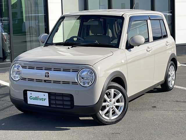 スズキ ラパン L 道東・釧路十勝 2016(平28)年 5万km フォーンベージュM ・4WD/・純正メモリナビ/(CD/FM/AM.フルセグ.BT.AUX.USB)/・全方位カメラ/バックカメラ/・純正エンジンスターター/・衝突軽減システム/・横滑り防止/・前席シートヒーター/・ハロゲンライト/・ヘッドライトレベライザー/・アイドリングストップ/・ステアリングスイッチ/・純正フロアマット/・ドアバイザー/・スマートキー