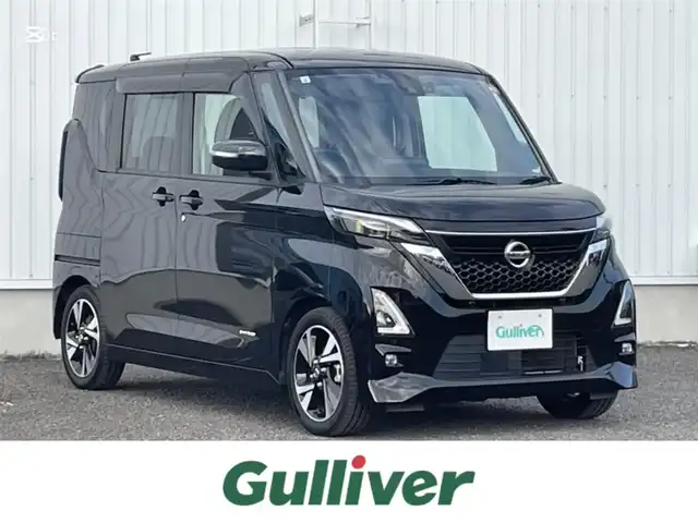 日産 ルークス ハイウェイスター Gターボ 熊本県 2021(令3)年 2.6万km ブラック 純正SDナビ/・Bluetooth/AM/FM/CD/DVD/ブルーレイ/フルセグTV/SD/ipod/ミュージックサーバー/プロパイロット/・エマージェンシーブレーキ/・車線逸脱警報/・車線逸脱防止支援/・先行車発進お知らせ機能/・道路標識認識機能/インテリジェントクルーズコントロール/バックカメラ/・全方位カメラ/・ふらつき警報/ドライブレコーダー/両側パワースライドドア/・ハンズフリーオートスライドドア/コーナーセンサー前後/盗難防止装置/オートマチックハイビーム/LEDヘッドライト/エアバッグダブル/ステアリングスイッチ/ウィンカーミラー/電動格納ミラー/シートヒーター/電子パーキングブレーキ/オートホールド/ロールサンシェード/スマートキー/プッシュスタートボタン/ETC/ＳＯＳボタン/純正ドアバイザー/純正フロアマット/純正アルミホイール
