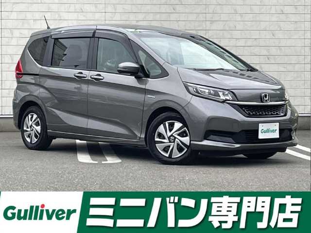 ホンダ フリード ハイブリット G ホンダセンシング 福岡県 2021(令3)年 4.9万km スーパープラチナグレーメタリック 純正7型SDナビ(フルセグTV/CD/DVD/BT)ホンダセンシングバックカメラ両側パワスラレーダークルコンETCUSB純正フロアマット純正LEDプッシュスタートスマートキースペアキー