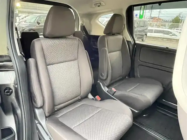 ホンダ フリード ハイブリット G ホンダセンシング 福岡県 2021(令3)年 4.9万km スーパープラチナグレーメタリック 純正7型SDナビ(フルセグTV/CD/DVD/BT)ホンダセンシングバックカメラ両側パワスラレーダークルコンETCUSB純正フロアマット純正LEDプッシュスタートスマートキースペアキー