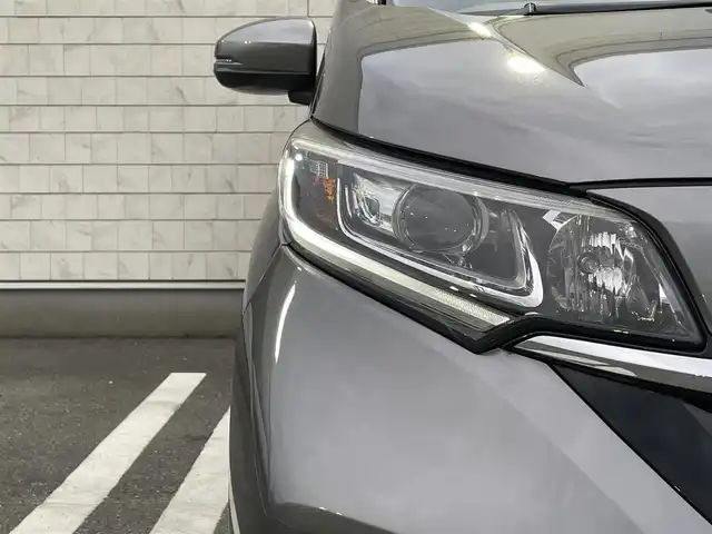 ホンダ フリード ハイブリット G ホンダセンシング 福岡県 2021(令3)年 4.9万km スーパープラチナグレーメタリック 純正7型SDナビ(フルセグTV/CD/DVD/BT)ホンダセンシングバックカメラ両側パワスラレーダークルコンETCUSB純正フロアマット純正LEDプッシュスタートスマートキースペアキー