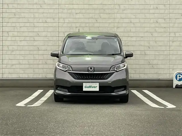 ホンダ フリード ハイブリット G ホンダセンシング 福岡県 2021(令3)年 4.9万km スーパープラチナグレーメタリック 純正7型SDナビ(フルセグTV/CD/DVD/BT)ホンダセンシングバックカメラ両側パワスラレーダークルコンETCUSB純正フロアマット純正LEDプッシュスタートスマートキースペアキー