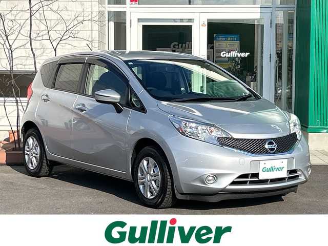 日産 ノート X FOUR 青森県 2015(平27)年 2.6万km ブリリアントシルバー 4WD/社外メモリナビ/Bluetooth・USB・SD・AUX/ETC/横滑り防止装置/エマージェンシーブレーキレス/ハロゲンヘッドライト/オートライト/プッシュスタート/インテリキー/スペアキー/14インチホイルスタッドレスタイヤ/14インチホイル夏タイヤあり