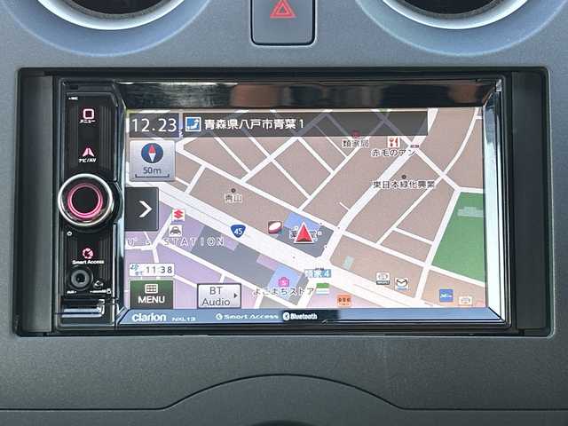 日産 ノート X FOUR 青森県 2015(平27)年 2.6万km ブリリアントシルバー 4WD/社外メモリナビ/Bluetooth・USB・SD・AUX/ETC/横滑り防止装置/エマージェンシーブレーキレス/ハロゲンヘッドライト/オートライト/プッシュスタート/インテリキー/スペアキー/14インチホイルスタッドレスタイヤ/14インチホイル夏タイヤあり