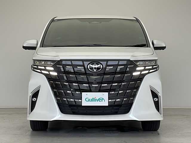 トヨタ アルファード Z 愛知県 2024(令6)年 1.1万km プラチナホワイトパールマイカ 衝突軽減システム/純正ディスプレイオーディオ（ナビあり）/フリップダウンモニター/三眼LEDヘッドライト/全方位カメラ/両側パワースライドドア/ガラスルーフ/レーダークルーズコントロール/シートヒーター/エアシート/フルセグ/Bluetooth/バックカメラ/電動リアゲート/パワーシート/コーナーセンサー/純正アルミホイール/ＥＴＣ２．０/ブラインドスポットモニター/ステアリングヒーター/インテリジェントミラー/オートマチックハイビーム/置くだけ充電器/ステアリングスイッチ/スマートキー/プッシュスタート