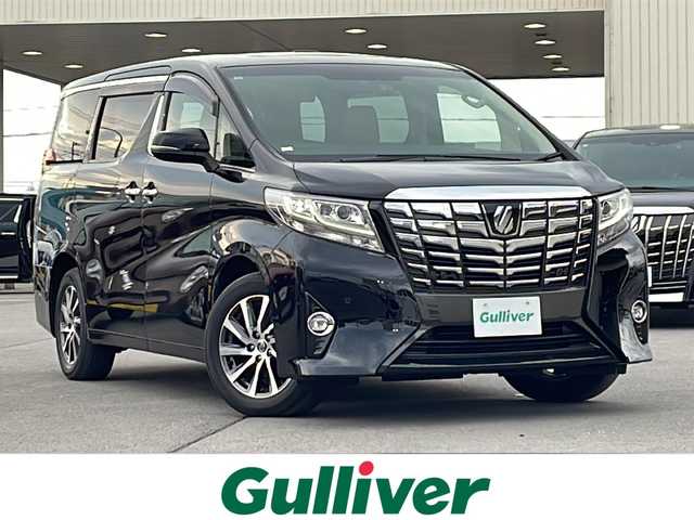 トヨタ アルファード エグゼクティブ ラウンジ 道北・旭川 2017(平29)年 6万km ブラック 4WD/禁煙車/Wサンルーフ /メーカーOP・ＳＤナビ/　ＣＤ・ＤＶＤ・ＢＤ・ＳＤ・ＢＴ・フルセグ/ＪＢＬプレミアムサウンドシステム/ベージュ革シート/全方位カメラ/テレビキャンセラー/リアエンターテイメントシステム/１００Ｖコンセント・HDMI・VIDEO入力/プリクラッシュセーフティ/追従型クルーズコントロール/オートライト・オートハイビーム/ブレーキホールド/クリアランスソナー/純正１７インチアルミ夏タイヤ/ウッドコンビハンドル/ハンドルヒーター/両側パワースライドドア/電動リアゲート/前席シートヒーター/助手席・２列目オットマン/２列目パワーシート・エアシート/新車時保証書/ETC２．０