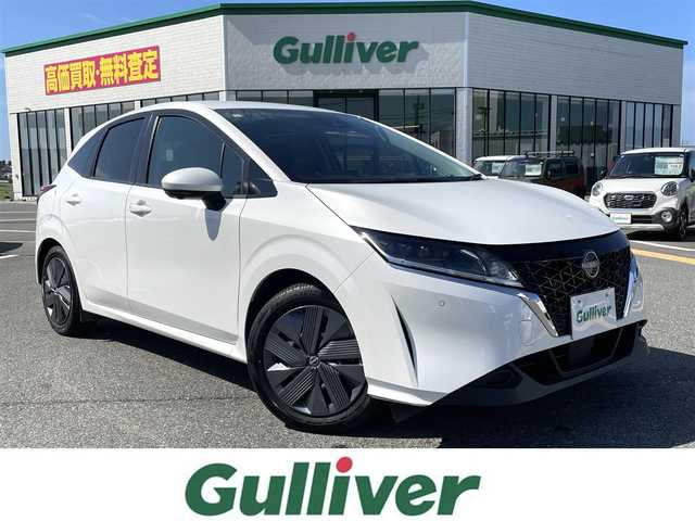 日産 ノート X FOUR 鳥取県 2023(令5)年 2.5万km ピュアホワイトパール ４・Ｗ・Ｄ/社外ナビ／ＣＤ／ＢＴ/アラウンドビューモニター/ＥＴＣ・ドライブレコーダー/インテリジェントルームミラー/ＬＥＤヘットライト/オートライト/エマージェンシーブレーキ/レーンキープアシスト/シートヒーター/ステアリングヒーター/プッシュエンジンスタート/前後クリアランスソナー/電動パーキングブレーキ/スペアキーｘ１