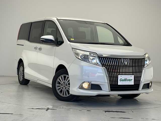 トヨタ エスクァイア Gi 沖縄県 2015(平27)年 7.7万km ホワイトパールクリスタルシャイン 純正SDナビ（NSZT-W64）/　CD/DVD/SD/BT/フルセグ/リアエンターテインメント/バックカメラ/ETC/前後ドライブレコーダー/両側パワースライドドア/クルーズコントロール/コーナーセンサー/合皮シート/前席シートヒーター/LEDヘッドライト/オートライト/純正１５インチAW/純正フロアマット/プッシュスタート/スマートキ/スペアキー