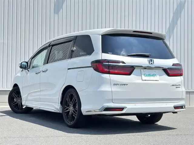 ホンダ オデッセイ ハイブリッド e:HEVアブソルート EX 群馬県 2021(令3)年 0.9万km プラチナホワイトパール ホンダセンシング/純正ＳＤナビ/（CD/DVD/SD/BT/USB/HDMI）/全方位カメラ/フルセグTV/電動リアゲート/ビルトインETC2.0/レーダークルコン/ハーフレザー/シートヒーター（D席/N席）/パワーシート（D席/N席）/両側パワースライドドア/ステアリングスイッチ/100V充電/純正前後ドラレコ/純正AW/純正フロアマット/LEDヘッドライト/アイドリングストップ/ドアバイザー/保証書/取説/スペアキー
