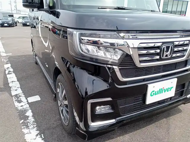 ホンダ Ｎ ＢＯＸ カスタム L 福井県 2021(令3)年 3.7万km クリスタルブラックパール 衝突被害軽減システム/レーダークルーズコントロール/純正ディーラーオプションナビ（VXM-214VFi）/・（フルセグTV/CD/DVD/Bluetooth）/バックカメラ/ビルトインETC/前方ドライブレコーダー/両側パワースライドドア/革調シートカバー/サンシェード/純正14インチAW/純正フロアマット/スマートキー