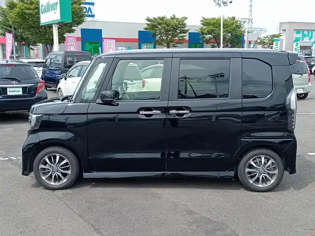 ホンダ Ｎ ＢＯＸ カスタム L 福井県 2021(令3)年 3.7万km クリスタルブラックパール 衝突被害軽減システム/レーダークルーズコントロール/純正ディーラーオプションナビ（VXM-214VFi）/・（フルセグTV/CD/DVD/Bluetooth）/バックカメラ/ビルトインETC/前方ドライブレコーダー/両側パワースライドドア/革調シートカバー/サンシェード/純正14インチAW/純正フロアマット/スマートキー