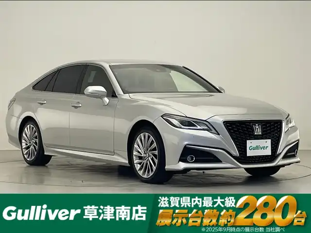 トヨタ クラウン ハイブリッド S 滋賀県 2020(令2)年 4.7万km シルバーM 純正12.3インチナビ/CD/DVD/Bluetooth/AppleCarPlay/AndroidAuto/フルセグテレビ/パノラミックビューモニター/セーフティセンス/・レーントレーシングアシスト/・レーダークルーズコントロール/・プリクラッシュセーフティ/・オートマチックハイビーム/・ロードサインアシスト/・先行車発進告知機能/・ドライバー異常時対応システム/セーフティパッケージプラス/ブラインドスポットモニター/LEDヘッドライト/ハーフレザーシート/D/N席パワーシート/D/N席シートヒーター /ステアリングヒーター/ETC2.0/AC100V/オプション18インチアルミホイール