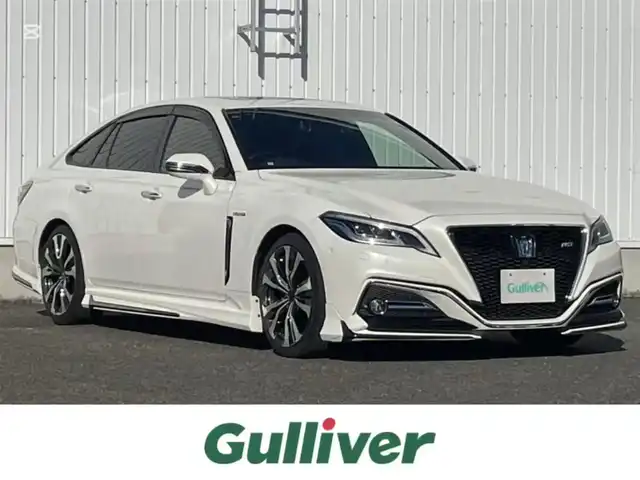 トヨタ クラウン ハイブリッド RS アドバンス 熊本県 2019(平31)年 2.7万km ホワイトパールクリスタルシャイン 純正ナビ/・AM/FM/CD/DVD/BT/SD/・Miracast/・フルセグTV/全周囲カメラ/サンルーフ/トヨタセーフティセンス/・プリクラッシュセーフティ/・レーントレーシングアシスト/・ブラインドスポットモニター/・ロードサインアシスト/・オートマチックハイビーム/・レーダークルーズコントロール/・リアクロストラフィックアラート/ヘッドアップディスプレイ/デジタルインナーミラー/モデリスタエアロ/モデリスタアルミホイール/ドライブレコーダー/ETC2.0/前席パワーシート/D席メモリ付き/前席シートヒーター/電動パーキングブレーキ/オートホールドブレーキ/純正フロアマット/革巻きステアリング/ステアリングスイッチ/パドルシフト/電動格納ミラー/ウインカーミラー/ドアバイザー/プッシュスタート