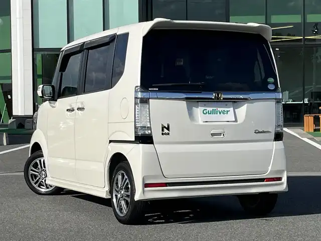 ホンダ Ｎ ＢＯＸ 2トーン カスタム SSパッケージ 奈良県 2015(平27)年 7万km プレミアムホワイトパール KENWOODナビ/（フルセグ/BT/CD/DVD）/バックカメラ/衝突軽減システム/両側パワースライドドア/横滑り防止/オートライト/電動格納ミラー/純正14インチAW/スペアキーX1