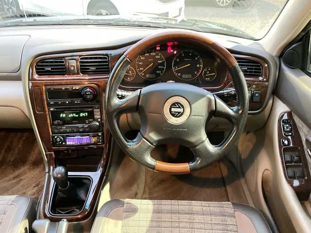 スバル レガシィ ランカスター 神奈川県 1999(平11)年 8万km ダークグリーンマイカ/ウォームグレーオパール ワンオーナー/ハーフレザーシート/MOMO革ウッドコンビステアリング/タワーバー/ウッド調パネル/純正オーディオ/キーレスキー/スペアキー/保証書/取扱説明書