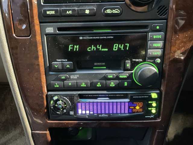 スバル レガシィ ランカスター 神奈川県 1999(平11)年 8万km ダークグリーンマイカ/ウォームグレーオパール ワンオーナー/ハーフレザーシート/MOMO革ウッドコンビステアリング/タワーバー/ウッド調パネル/純正オーディオ/キーレスキー/スペアキー/保証書/取扱説明書