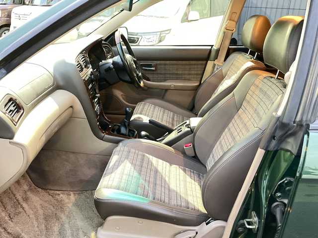 スバル レガシィ ランカスター 神奈川県 1999(平11)年 8万km ダークグリーンマイカ/ウォームグレーオパール ワンオーナー/ハーフレザーシート/MOMO革ウッドコンビステアリング/タワーバー/ウッド調パネル/純正オーディオ/キーレスキー/スペアキー/保証書/取扱説明書