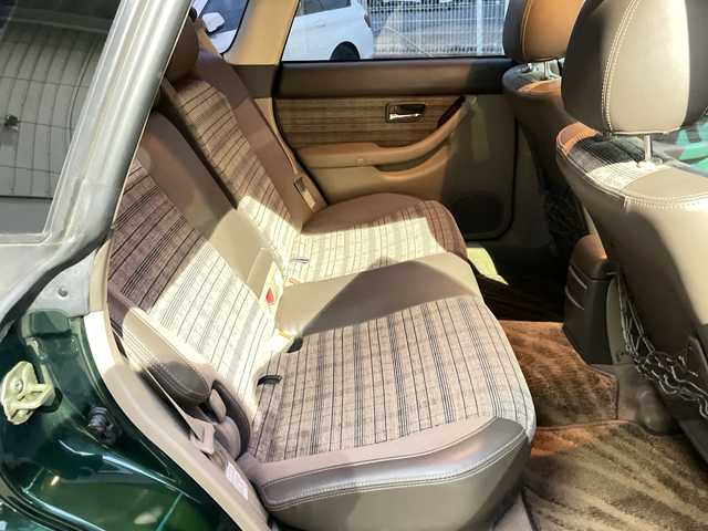 スバル レガシィ ランカスター 神奈川県 1999(平11)年 8万km ダークグリーンマイカ/ウォームグレーオパール ワンオーナー/ハーフレザーシート/MOMO革ウッドコンビステアリング/タワーバー/ウッド調パネル/純正オーディオ/キーレスキー/スペアキー/保証書/取扱説明書