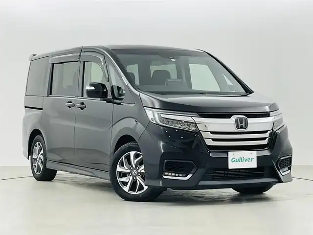 ホンダ ステップワゴン スパーダ ホンダセンシング 福島県 2019(令1)年 4.5万km プレミアムスパークルブラックパール ホンダセンシング/・CMBS/・ACC/・先行車発進告知/・路外逸脱抑制/・レーンキープアシスト/・標識認識機能/純正メモリナビゲーション/【AM/FM/DVD/CD/Bluetooth/フルセグTV】/型番：VXM-175VFI/バックカメラ/ビルトインＥＴＣ/両側パワースライドドア/ステアリングリモコン/プッシュスタート/・スマートキー/革巻きステアリング/オートライト/・ＬＥＤライト/電動格納ミラー/横滑り防止機能/ドアバイザー/純正フロアマット