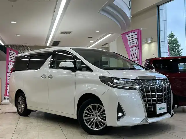 トヨタ アルファードハイブリット G Fパッケージ 東京都 2022(令4)年 4.7万km ホワイトパールクリスタルシャイン 〇ワンオーナー/〇革シート/〇純正メモリーナビ/　CD/DVD/BT/フルセグ/〇バックカメラ/〇ETC/〇ACC/〇LKA/〇AC100V/〇ステアリングヒーター/〇オートハイビームアシスト/〇ウッドコンビハンドル/〇前席パワーシート/〇前席エアーシート/〇前席シートヒーター/〇運転席3Wayメモリーシート/〇木目調パネル/〇ステアリングスイッチ/〇前後ドライブレコーダー/〇パワーバックドア/〇保証書/〇取扱説明書/〇記録簿（R4.12/R6.2/R7.1）