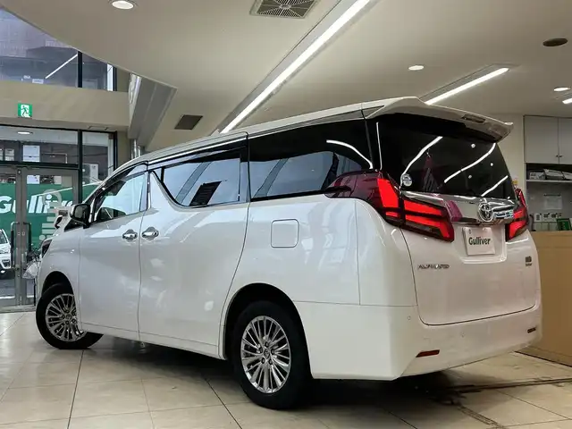 トヨタ アルファードハイブリット G Fパッケージ 東京都 2022(令4)年 4.7万km ホワイトパールクリスタルシャイン 〇ワンオーナー/〇革シート/〇純正メモリーナビ/　CD/DVD/BT/フルセグ/〇バックカメラ/〇ETC/〇ACC/〇LKA/〇AC100V/〇ステアリングヒーター/〇オートハイビームアシスト/〇ウッドコンビハンドル/〇前席パワーシート/〇前席エアーシート/〇前席シートヒーター/〇運転席3Wayメモリーシート/〇木目調パネル/〇ステアリングスイッチ/〇前後ドライブレコーダー/〇パワーバックドア/〇保証書/〇取扱説明書/〇記録簿（R4.12/R6.2/R7.1）