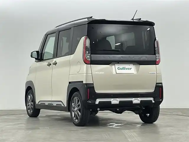 三菱 デリカミニ T プレミアム 福島県 2025(令7)年 0.1万km未満 ナチュラルアイボリーメタリック 登録済み未使用車/純正ポータブルナビゲーション/【Am/FM/USB/HDMI/Bluetooth/AppleCarPlay】/・全方位カメラ/・デジタルインナーミラー/衝突軽減ブレーキ/レーンキープアシスト/車線逸脱警報装置/アダプティブクルーズコントロール/前後コーナーセンサー/ルーフレール/4WD/ターボ/電子パーキングブレーキ/・ブレーキオートホールド/LEDヘッドライト/・LEDフロントフォグライト/・オートライト/両側パワースライドドア/ハーフレザーシート/・運転席＋助手席シートヒーター/ステアリングスイッチ/・ステアリングヒーター/純正15インチアルミホイール/電動格納ウィンカーミラー/アイドリングストップ/ABS/横滑り防止装置/盗難防止装置/ダウンヒルアシスト/プッシュスタート/・スマートキー/・スペアキー/取扱説明書
