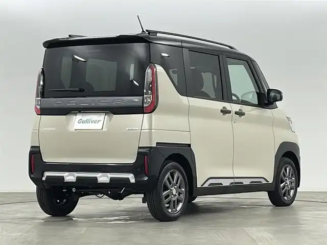 三菱 デリカミニ T プレミアム 福島県 2025(令7)年 0.1万km未満 ナチュラルアイボリーメタリック 登録済み未使用車/純正ポータブルナビゲーション/【Am/FM/USB/HDMI/Bluetooth/AppleCarPlay】/・全方位カメラ/・デジタルインナーミラー/衝突軽減ブレーキ/レーンキープアシスト/車線逸脱警報装置/アダプティブクルーズコントロール/前後コーナーセンサー/ルーフレール/4WD/ターボ/電子パーキングブレーキ/・ブレーキオートホールド/LEDヘッドライト/・LEDフロントフォグライト/・オートライト/両側パワースライドドア/ハーフレザーシート/・運転席＋助手席シートヒーター/ステアリングスイッチ/・ステアリングヒーター/純正15インチアルミホイール/電動格納ウィンカーミラー/アイドリングストップ/ABS/横滑り防止装置/盗難防止装置/ダウンヒルアシスト/プッシュスタート/・スマートキー/・スペアキー/取扱説明書