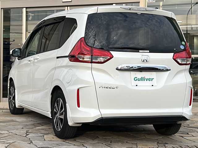 ホンダ フリード＋ G ホンダセンシング 静岡県 2018(平30)年 6.7万km ホワイトオーキッドパール 純正ナビ/・CD/・DVD/・Bluetooth/・SD/・FM/AM/・フルセグTV/ホンダセンシング/●衝突軽減ブレーキ〈CMBS〉/●誤発進抑制機能/●ACC〈アダプティブ・クルーズ・コントロール〉/●LKAS〈車線維持支援システム〉/●歩行者事故低減ステアリング/●路外逸脱抑制機能/●先行車発進お知らせ機能/●標識認識機能/主要装備/・バックカメラ/・両側パワースライドドア/・ドライブレコーダー/・ハーフレザーシート/(Sパッケージ専用インテリア)/・アイドリングストップ/・ＥＴＣ/・ＬＥＤヘッドライト/・アクティブコーナリングライト/・本革巻ステアリング/・純正15インチアルミ